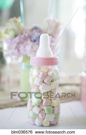 Close up of candy baby bottle gift View Large Photo Image Stock Photograph - Close up of candy baby bottle gift. Fotosearch