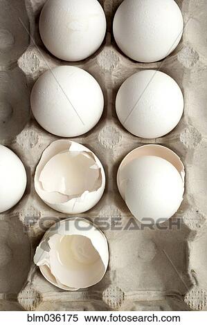 Close up of carton of eggs and eggshells View Large Photo Image Stock Photography - Close up of carton of eggs and eggshells. Fotosearch