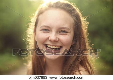Stock Image - Close up of Caucasian girl smiling. Fotosearch