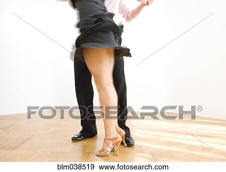 Close up of couple dancing in studio View Large Photo Image Stock Photo - Close up of couple dancing in studio. Fotosearch
