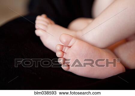 Close up of feet of baby boy View Large Photo Image Stock Image - Close up of feet of baby boy. Fotosearch