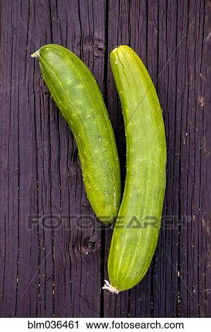 Stock Image - Close up of fresh cucumbers. Fotosearch