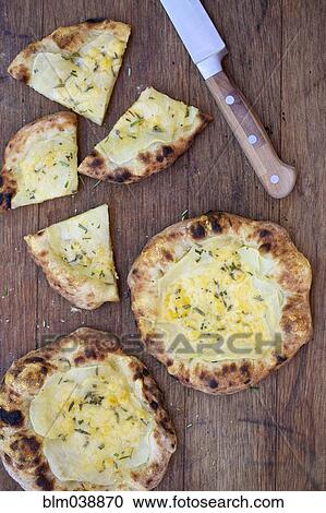 Stock Image - Close up of fresh flatbreads. Fotosearch
