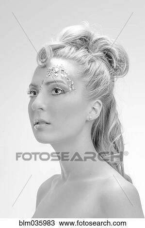 Close up of glamorous Caucasian woman looking up View Large Photo Image Stock Image - Close up of glamorous Caucasian woman looking up. Fotosearch