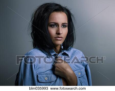 Close up of Hispanic woman with messy hair View Large Photo Image Stock Image - Close up of Hispanic woman with messy hair. Fotosearch