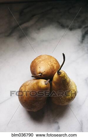 Close up of pears on marble counter View Large Photo Image Stock Image - Close up of pears on marble counter. Fotosearch