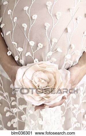Close up of pregnant bride carrying bouquet View Large Photo Image Stock Image - Close up of pregnant bride carrying bouquet. Fotosearch