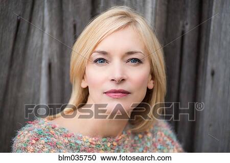 Stock Image - Close up of serious Caucasian woman. Fotosearch