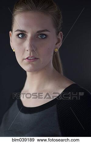 Close up of serious Caucasian woman View Large Photo Image Stock Photo - Close up of serious Caucasian woman. Fotosearch