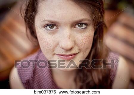 Stock Photograph - Close up of serious teenage girl. Fotosearch