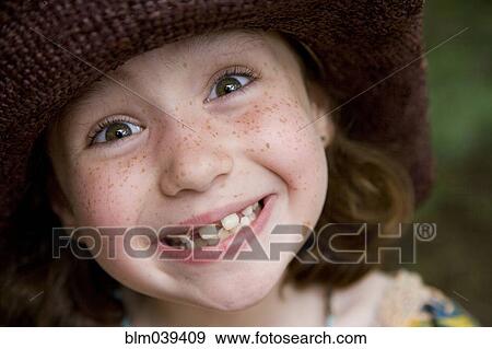 Stock Photo - Close up of smiling Caucasian girl. Fotosearch