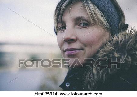 Picture - Close up of smiling Caucasian woman. Fotosearch