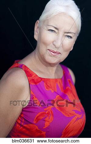Stock Image - Close up of smiling Caucasian woman. Fotosearch