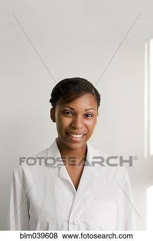 Stock Photo - Close up of smiling doctor. Fotosearch