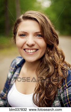 Close up of smiling girl View Large Photo Image Stock Image - Close up of smiling girl. Fotosearch