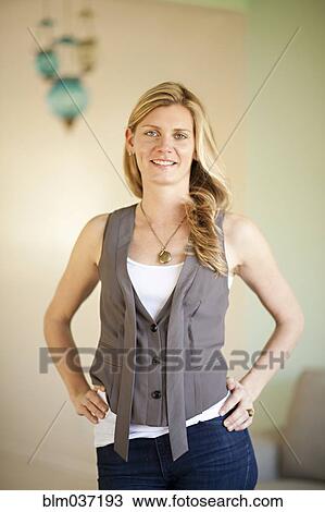 Close up of smiling woman with hands on hips View Large Photo Image Stock Image - Close up of smiling woman with hands on hips. Fotosearch