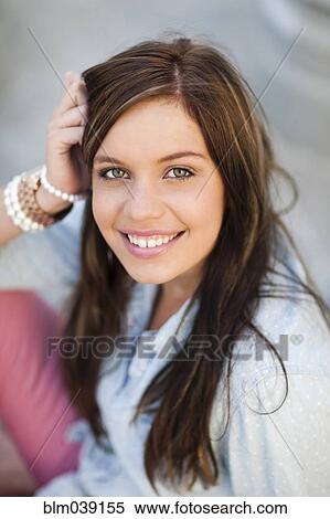 Close up of smiling woman with long hair View Large Photo Image Stock Photography - Close up of smiling woman with long hair. Fotosearch
