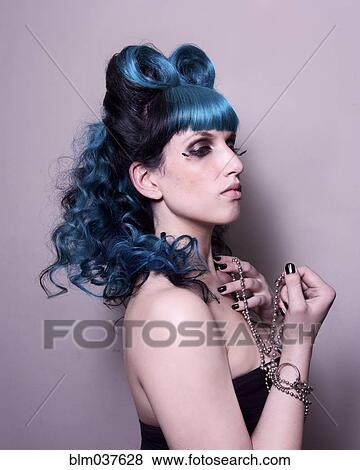 Close up of stylish woman with dyed hair and jewelry View Large Photo Image Stock Photo - Close up of stylish woman with dyed hair and jewelry. Fotosearch