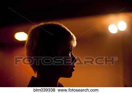 Stock Photo - Close up profile of Asian woman. Fotosearch