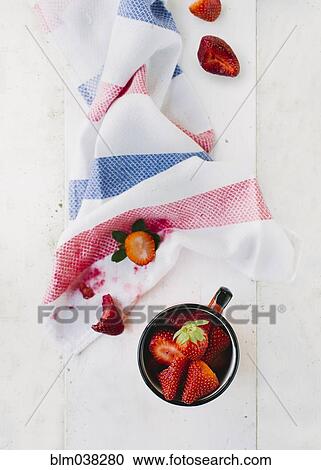 Stock Image - Fresh strawberries and towel. Fotosearch