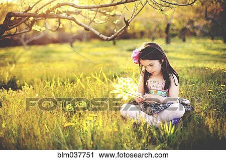 Girl playing with pinwheel in rural field View Large Photo Image Stock Image - Girl playing with pinwheel in rural field. Fotosearch