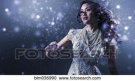 Glamorous Chinese woman dancing View Large Photo Image Stock Image - Glamorous Chinese woman dancing. Fotosearch