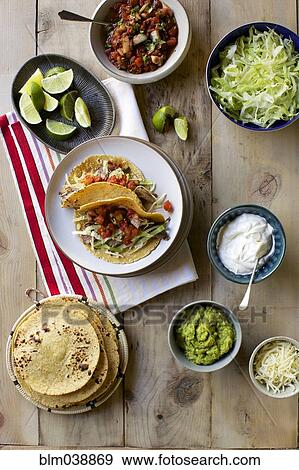 Stock Photo - High angle view of fresh taco ingredients. Fotosearch