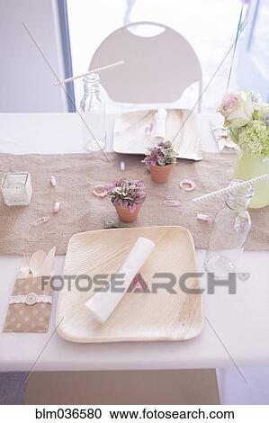 Stock Image - High angle view of place setting on table. Fotosearch