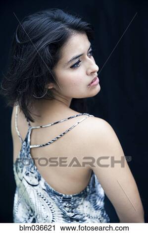 High angle view of serious mixed race woman View Large Photo Image Stock Image - High angle view of serious mixed race woman. Fotosearch
