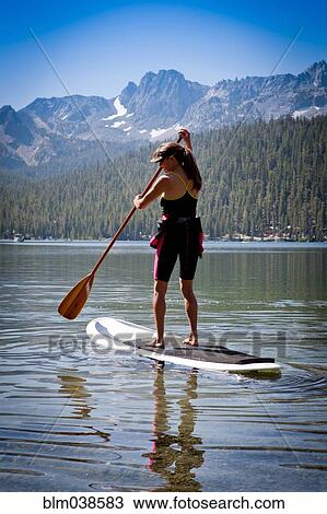 Mixed race woman on paddle board in Lake Tahoe, California, United States View Large Photo Image Stock Image - Mixed race woman on paddle board in Lake Tahoe, California, United States. Fotosearch