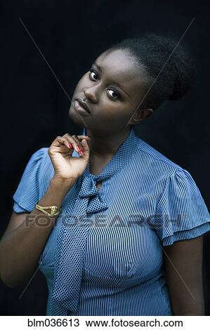 Pensive Black woman thinking View Large Photo Image Stock Image - Pensive Black woman thinking. Fotosearch