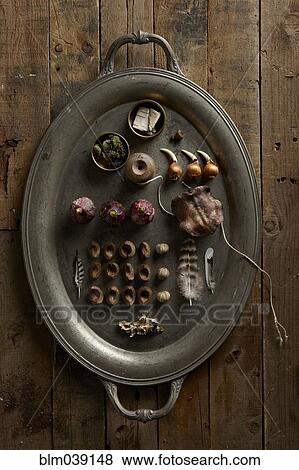 Platter of dried fruit, wood, plants and string View Large Photo Image Stock Photo - Platter of dried fruit, wood, plants and string. Fotosearch