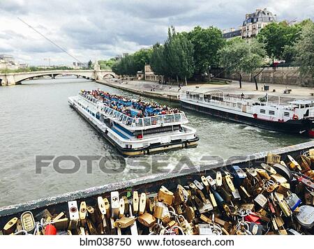 Pont des Arts Bridge overlooking ferries, Paris, Ile-de-France, France View Large Photo Image Stock Image - Pont des Arts Bridge overlooking ferries, Paris, Ile-de-France, France. Fotosearch