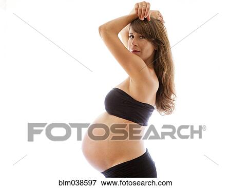 Stock Photo - Profile of pregnant Caucasian woman. Fotosearch