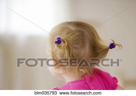 Rear view of baby girl with pigtails View Large Photo Image Stock Image - Rear view of baby girl with pigtails. Fotosearch
