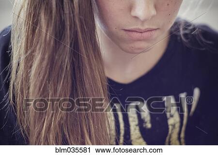 Stock Image - Sad Caucasian teenage girl. Fotosearch