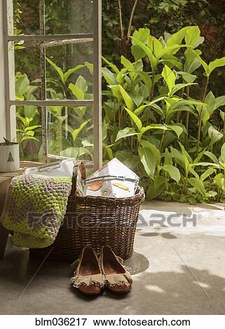 Shoes, basket and blanket near garden View Large Photo Image Stock Photo - Shoes, basket and blanket near garden. Fotosearch
