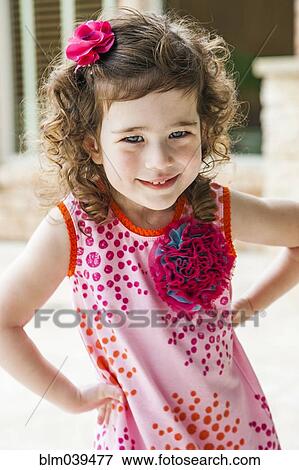 Smiling girl with hands on hips View Large Photo Image Stock Photo - Smiling girl with hands on hips. Fotosearch
