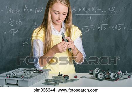 Student building vehicle in science class View Large Photo Image Picture - Student building vehicle in science class. Fotosearch