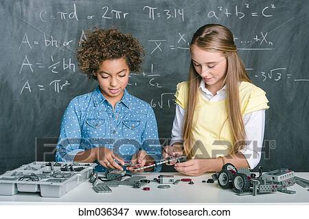 Students building vehicle in science class View Large Photo Image Stock Photo - Students building vehicle in science class. Fotosearch