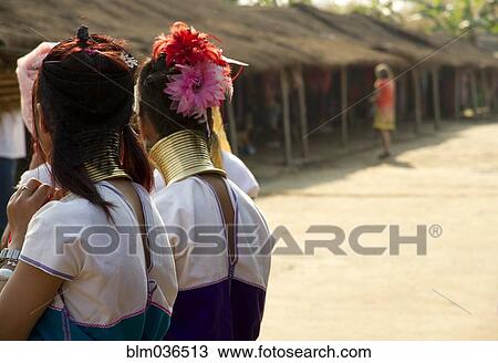 Students wearing traditional jewelry near huts View Large Photo Image Stock Image - Students wearing traditional jewelry near huts. Fotosearch