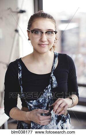 Stylish Hispanic woman smiling View Large Photo Image Stock Photo - Stylish Hispanic woman smiling. Fotosearch