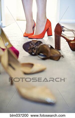 Woman choosing high heels View Large Photo Image Stock Image - Woman choosing high heels. Fotosearch