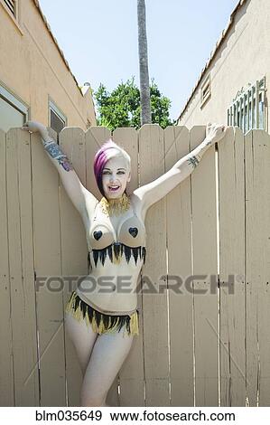Woman posing in provocative bikini View Large Photo Image Stock Photo - Woman posing in provocative bikini. Fotosearch
