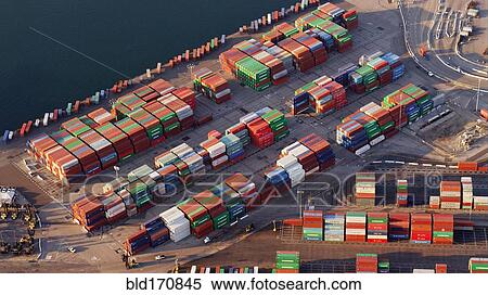 Stock Photography - Aerial view of containers in industrial shipyard. Fotosearch