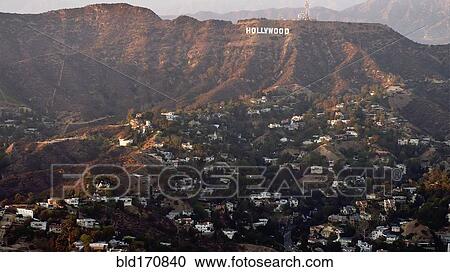 Stock Image - Aerial view of Hollywood sign over Los Angeles cityscape, California, United States. Fotosearch