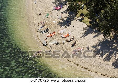 Stock Photography - Aerial view of kitesurfers on beach. Fotosearch