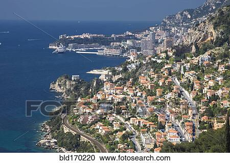 Stock Image - Aerial view of Monaco cityscape over ocean, Monte Carlo, Principality of Monaco. Fotosearch