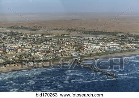 Stock Image - Aerial view of Swakopmund cityscape and beach, Namib Desert, Namibia. Fotosearch