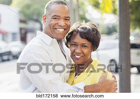 African American couple hugging in city View Large Photo Image Stock Photo - African American couple hugging in city. Fotosearch